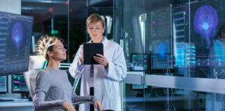 Scientist monitoring brain activity of a patient