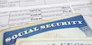 Social security cards on top of tax documents